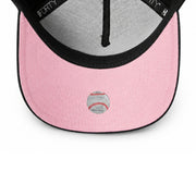 Pink baseball cap with a baseball graphic on a white background