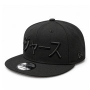 New Era Los Angeles Dodgers Japanese Black on Black 9FIFTY Snapback Hat - Pink Under Visor front left angled view