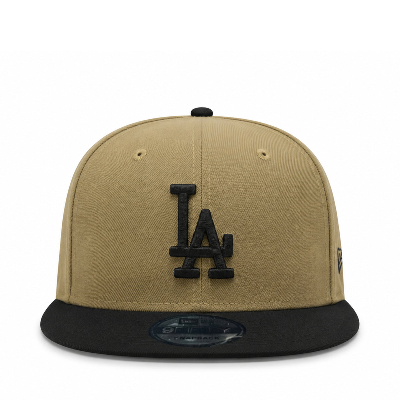 Beige and black baseball cap with LA logo on a white background