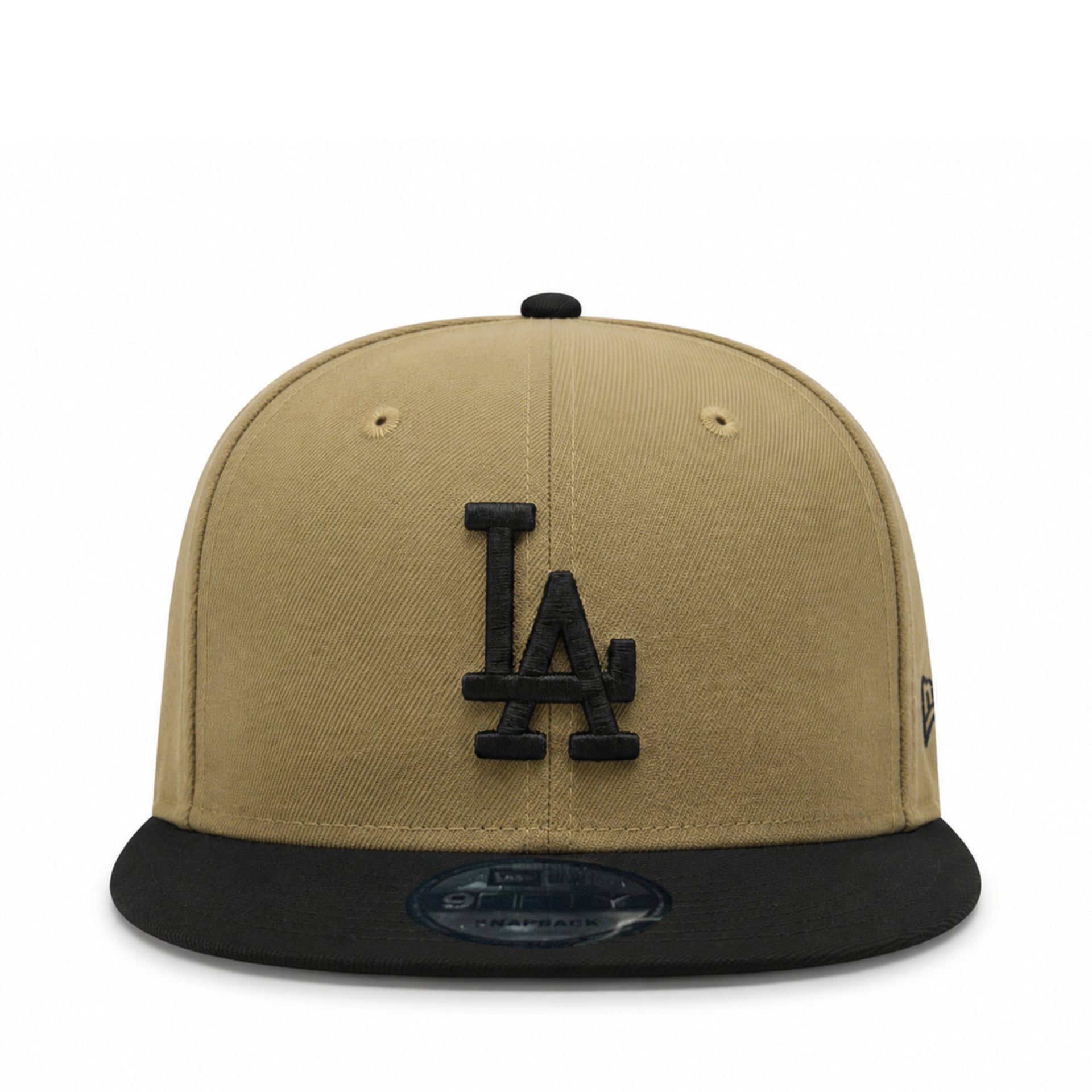 Beige and black baseball cap with LA logo on a white background
