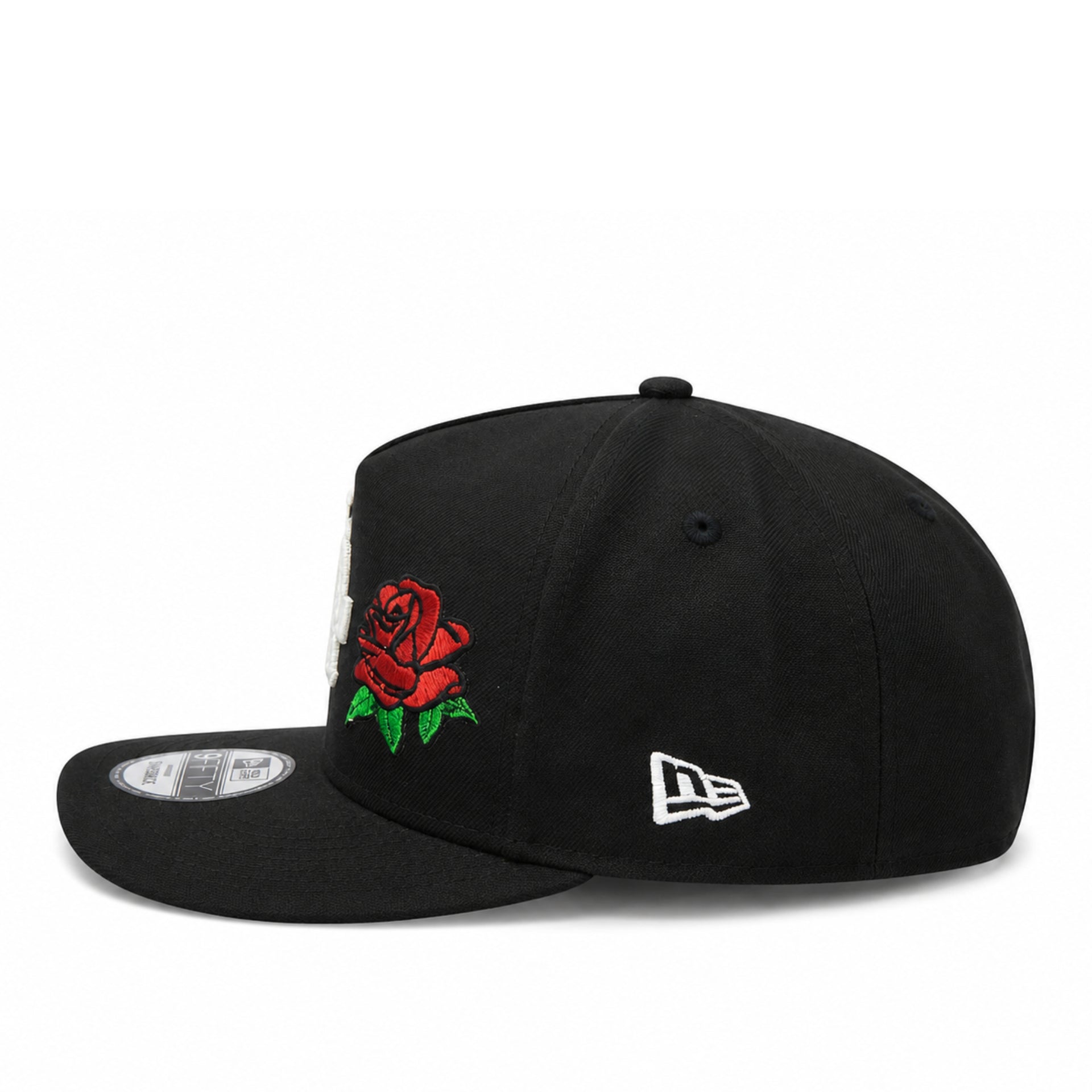 Black cap with a red rose design on a white background