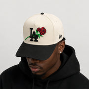 New Era Los Angeles Dodgers rose logo 9FIFTY A-Frame snapback cap in cream and black worn by male model