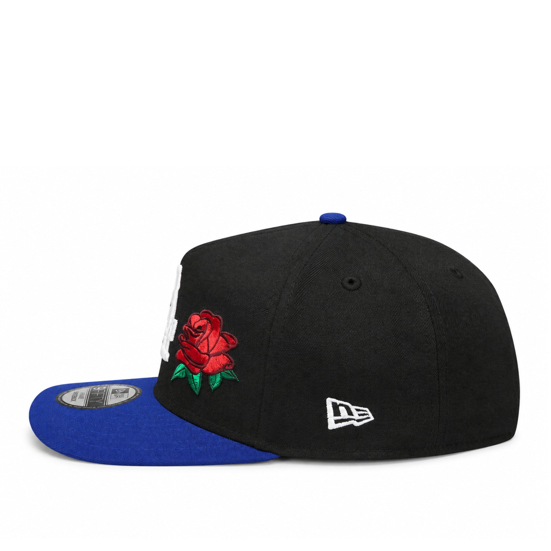 side view of New Era Los Angeles Dodgers Rose 9FIFTY A-Frame Snapback Hat in black and royal blue with embroidered LA logo and red rose detail.