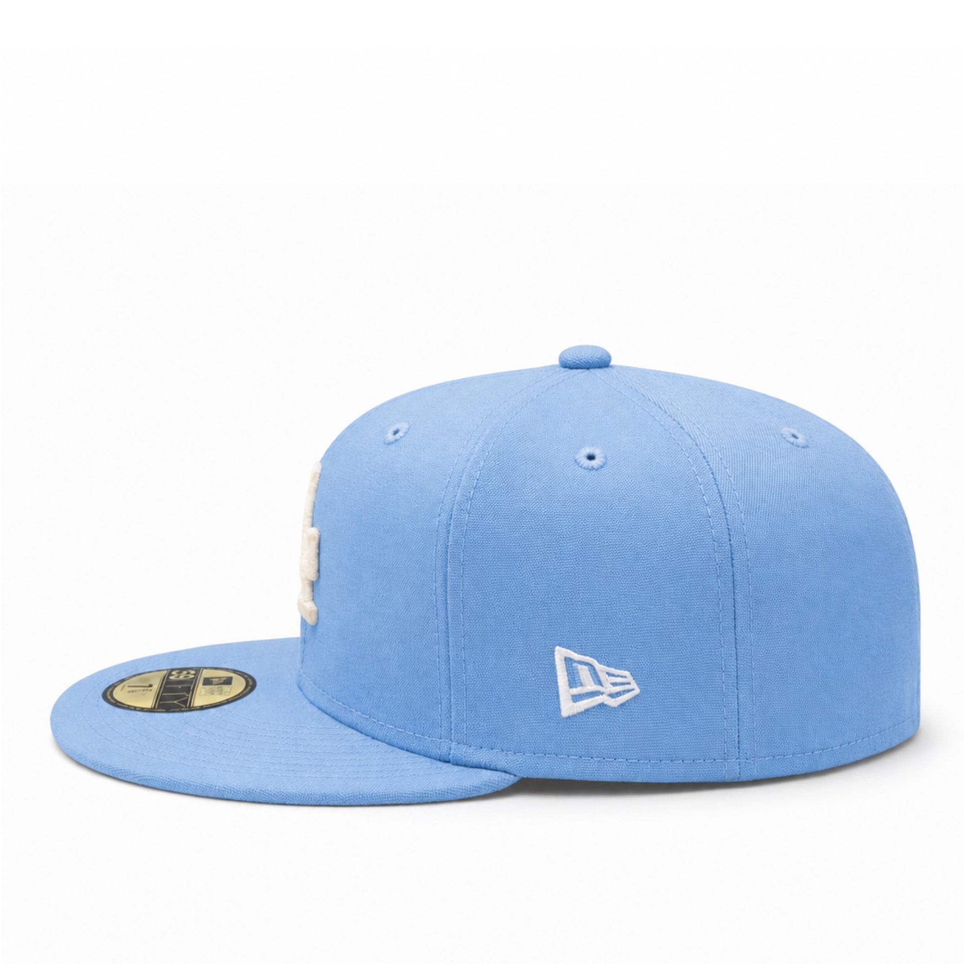 Light blue baseball cap with New Era logo on a white background