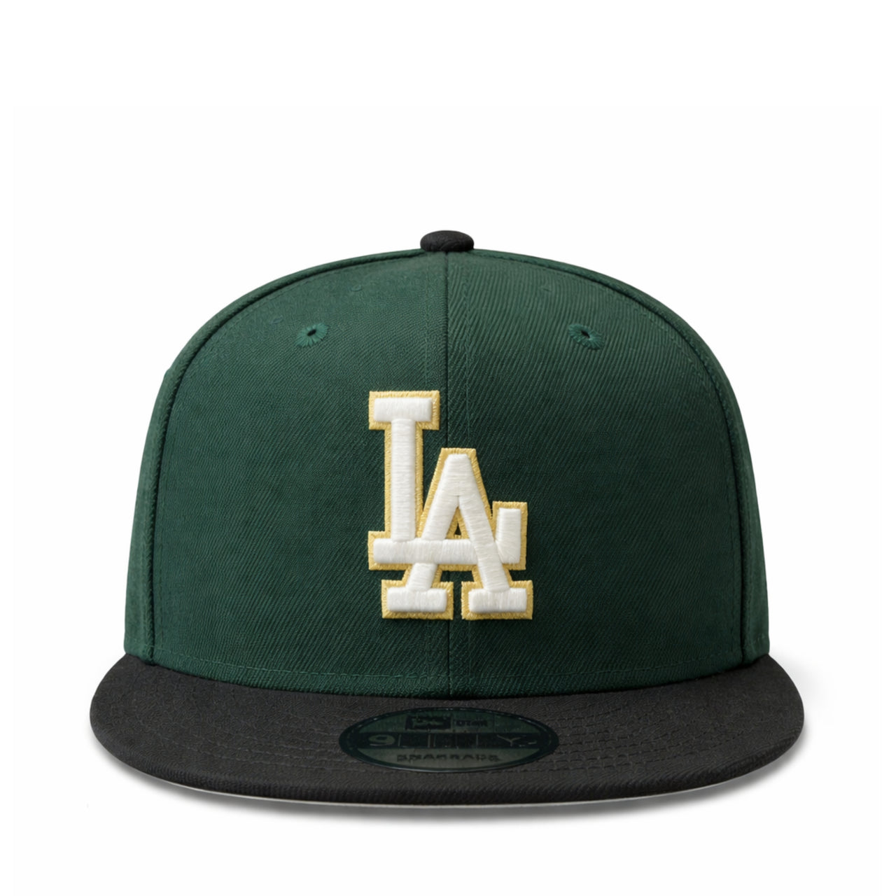 Green and black baseball cap with 'LA' logo on a white background