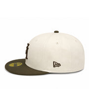Two-tone cap with beige top and brown brim on a white background