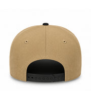 Back view of a tan structured snapback cap with a black adjustable strap and black button on a white background.