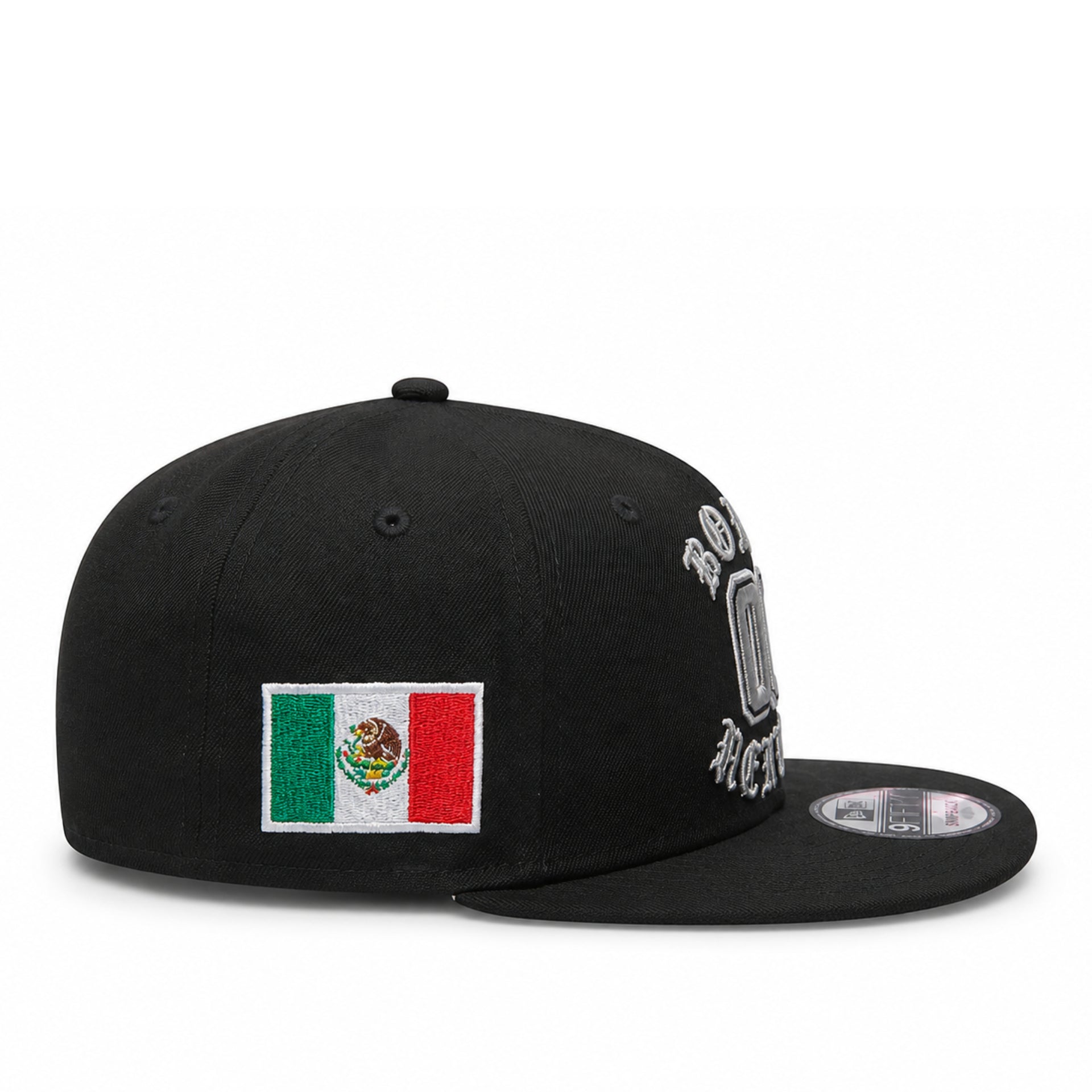 Black cap with Mexican flag patch and branding on a white background