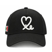 Front view of New Era Mexico Heart 9FORTY A-Frame black snapback with white heart embroidery