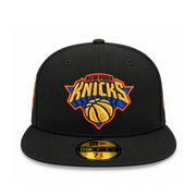 Front view of New Era New York Knicks 2026 Champions black 59FIFTY fitted hat with metallic gold Knicks logo