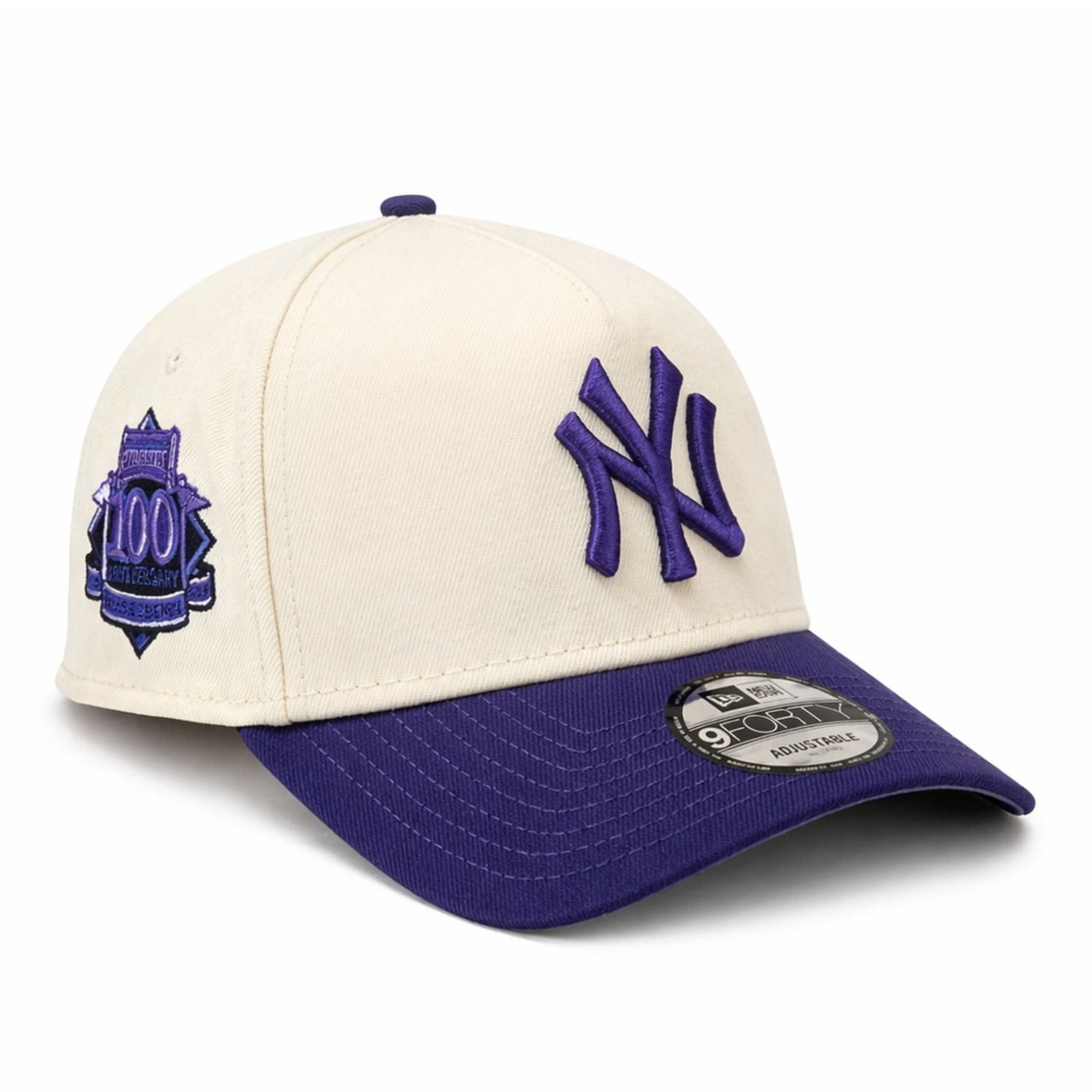 Baseball cap with purple logo and 100 th anniversary emblem on a white background