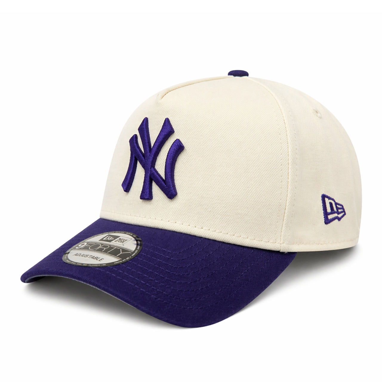 Two-tone baseball cap with purple and white design on a white background