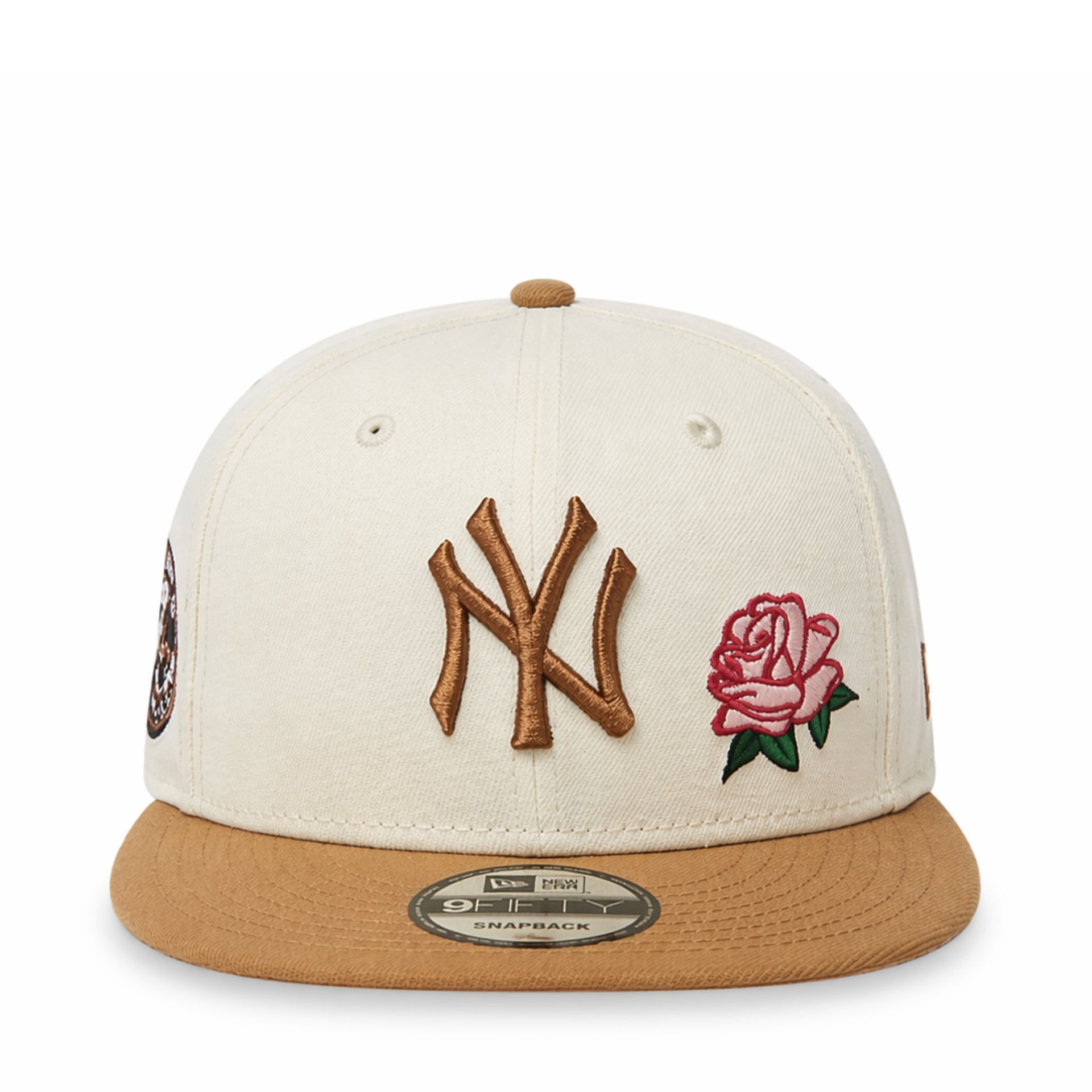 Baseball cap with embroidered logo and rose design on a white background