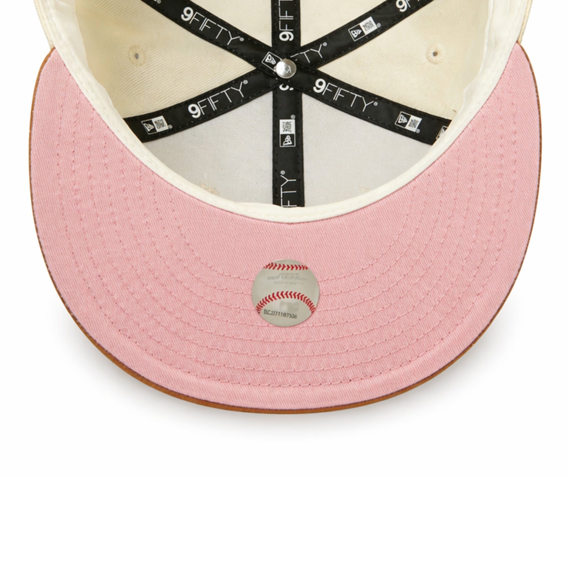 Pink baseball cap with '9FIFTY' logo on a white background