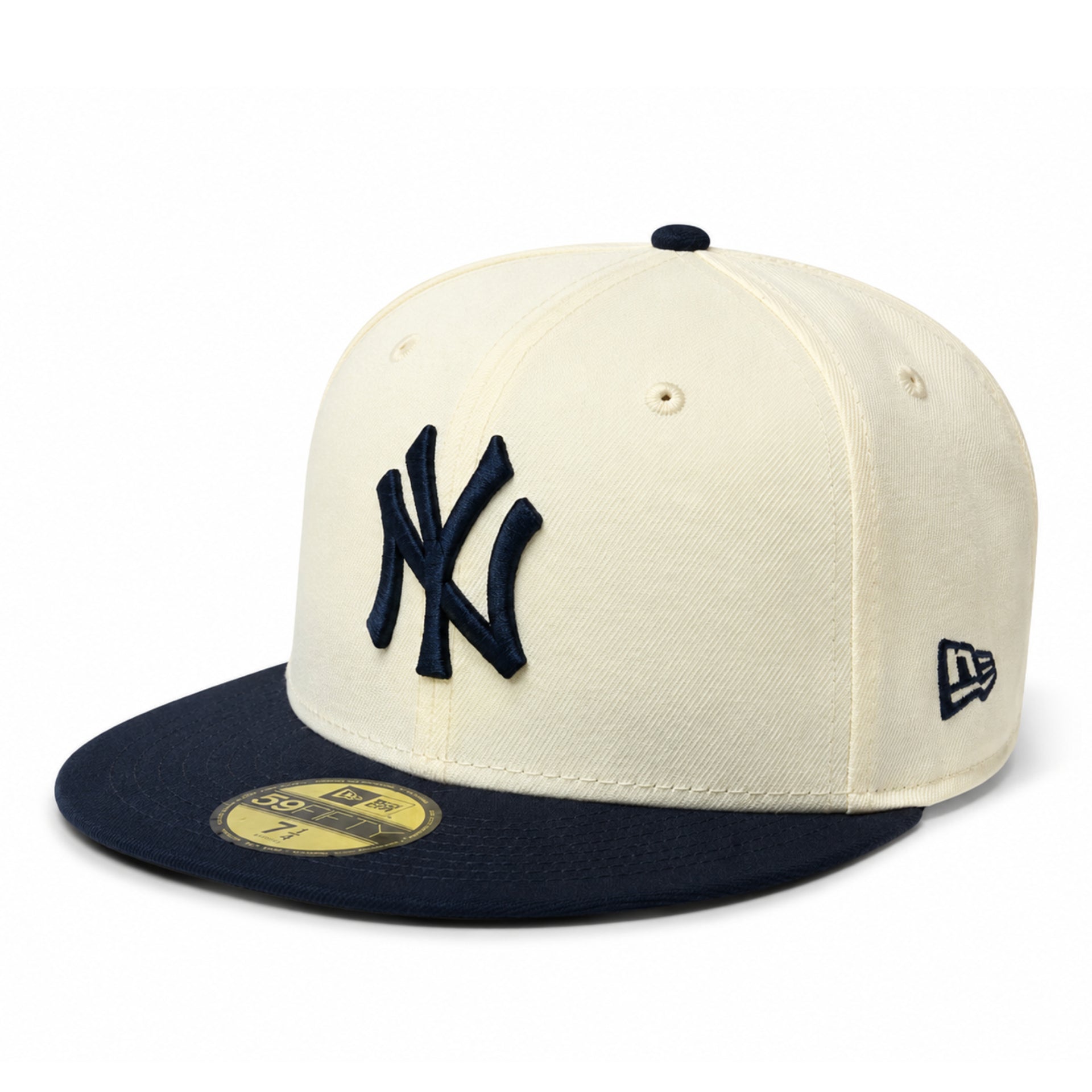 Angled view of New Era New York Yankees chrome navy 2 tone 59FIFTY fitted cap