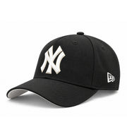 Opposite angled view of New Era Yankees black 9FORTY A-Frame snapback featuring the white embroidered New Era side flag and curved black brim