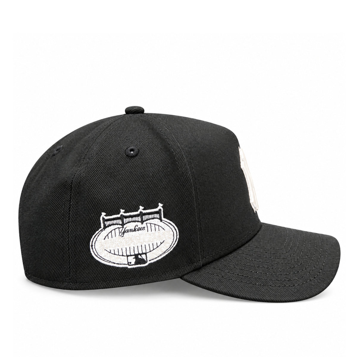 Side view of New Era Yankees All Star Game black 9FORTY A-Frame snapback showing the embroidered Yankee Stadium commemorative patch and curved visor