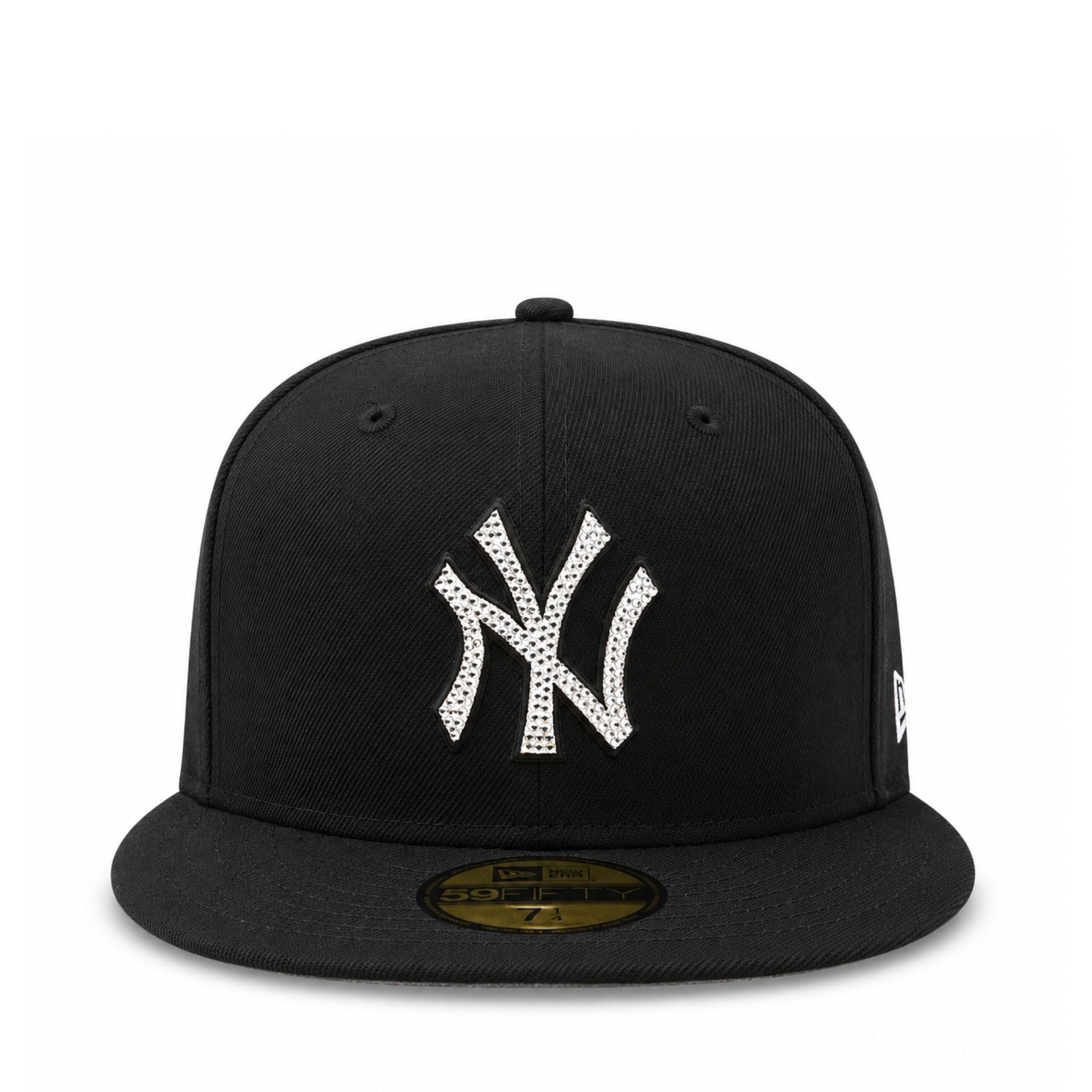 A black New York Yankees fitted cap featuring a white embroidered NY logo embellished with small rhinestones, set against a plain white background.