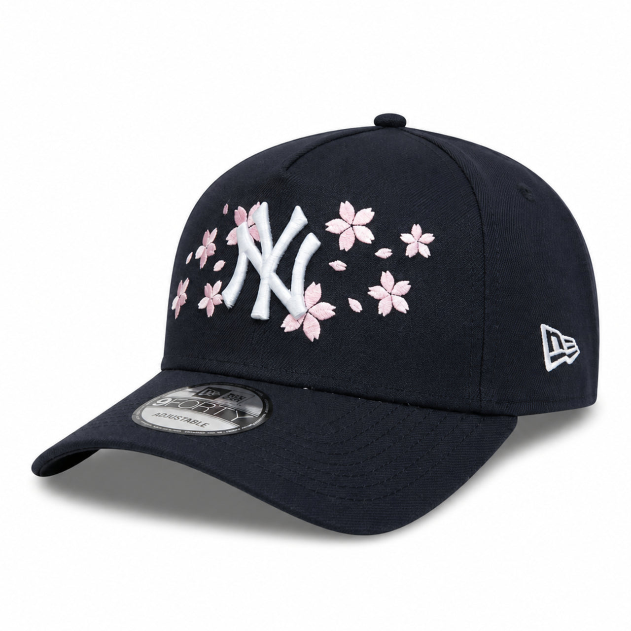 Black cap with New York Yankees with cherry blossom embroidered logo on a white background