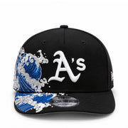 Black baseball cap with blue wave design and 'A's' logo on a white background