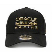 front view of  New Era Oracle Red Bull Racing black gold 9FORTY A-Frame snapback hat with gold embroidered logo
