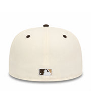 Baseball cap with a logo on the back against a white background
