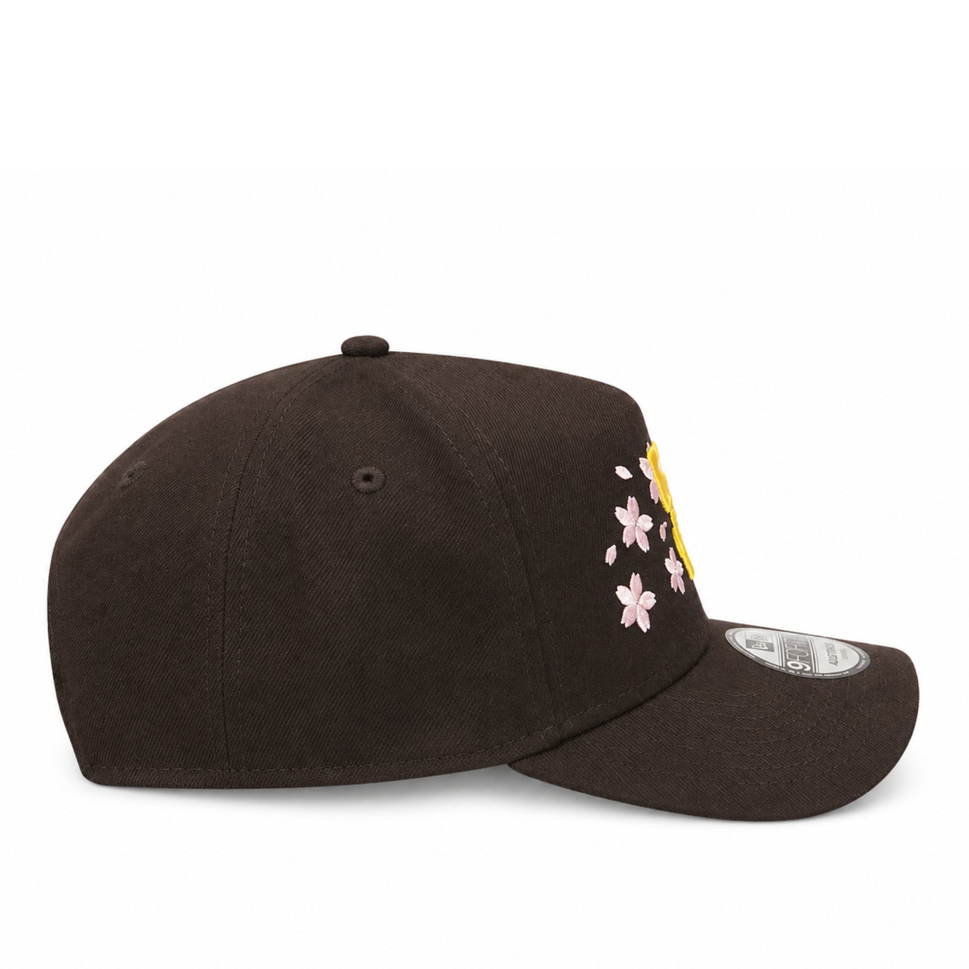 Brown cap with floral embroidery on a white background