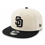 New Era San Diego Padres Chrome/Black 9FIFTY Snapback Hat front angled view