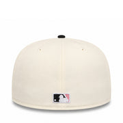 Baseball cap with a logo on the back against a white background