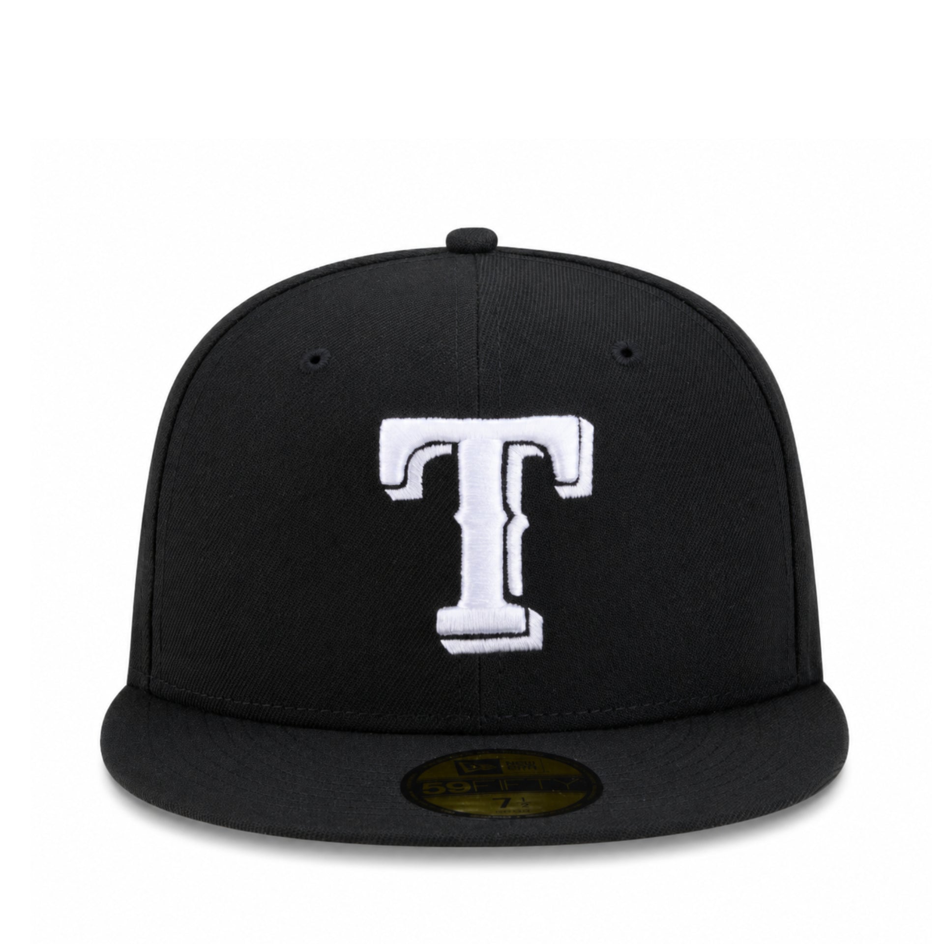 A black fitted baseball cap featuring a large white embroidered letter 'T' on the front, with a gold New Era 59FIFTY sticker on the brim, set against a plain white background.