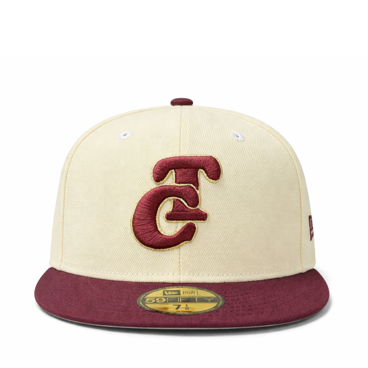 Beige and maroon baseball cap with logo TC on a white background