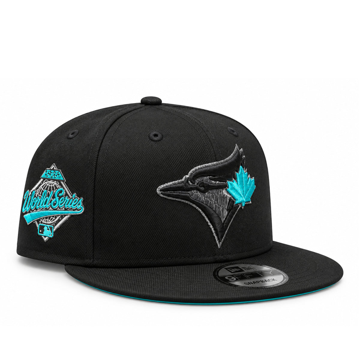 New Era Toronto Blue Jays Teal Black on Black 9FIFTY Snapback Hat featuring tonal black bird logo, teal maple leaf and World Series side patch