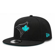 Opposite angled view of Toronto Blue Jays black 9FIFTY snapback with teal maple leaf logo and World Series embroidered side patch