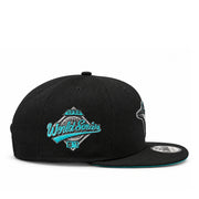 Side view of New Era Toronto Blue Jays black 9FIFTY snapback hat showing teal and silver 1993 World Series embroidered patch