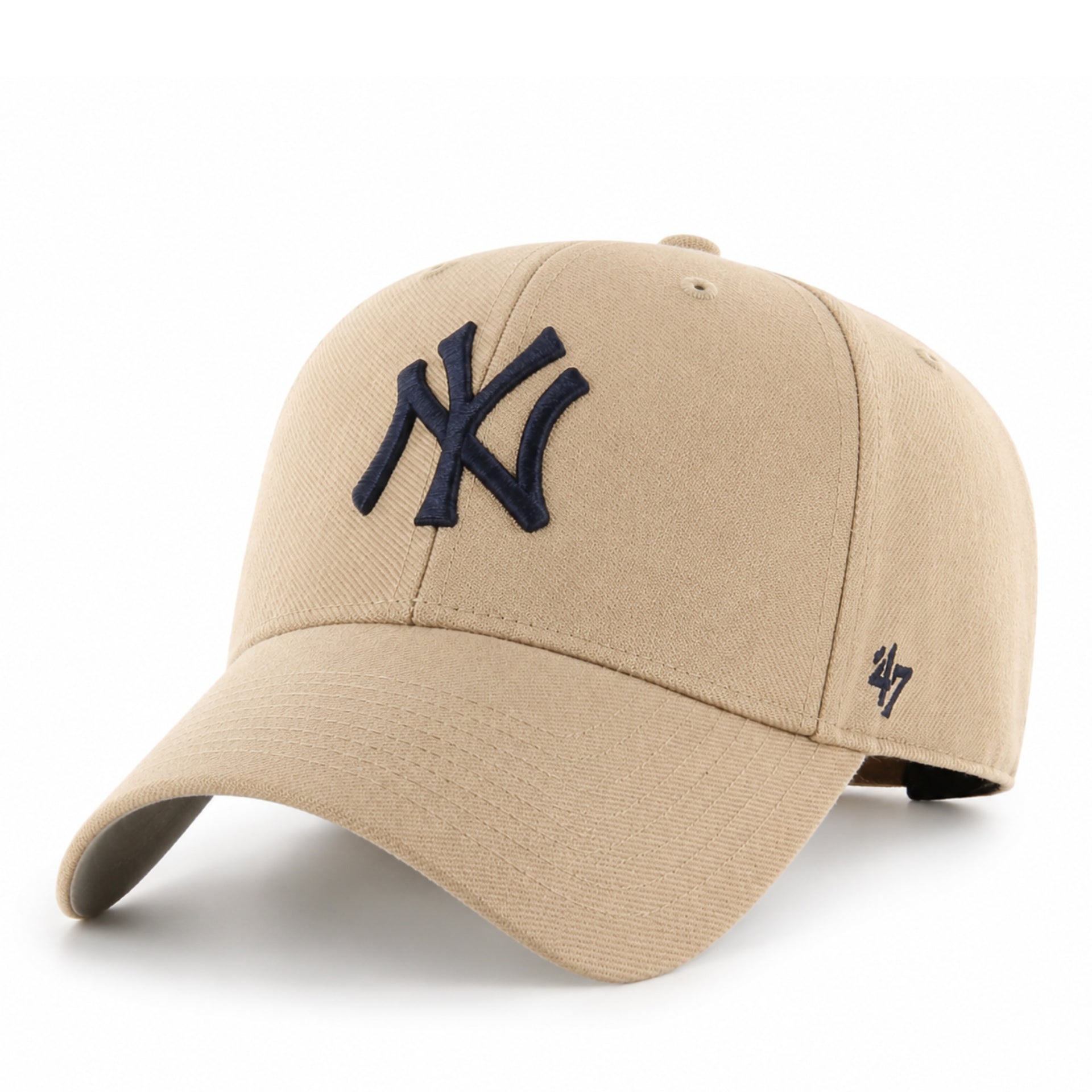 Beige cap with New York Yankees logo on a white background