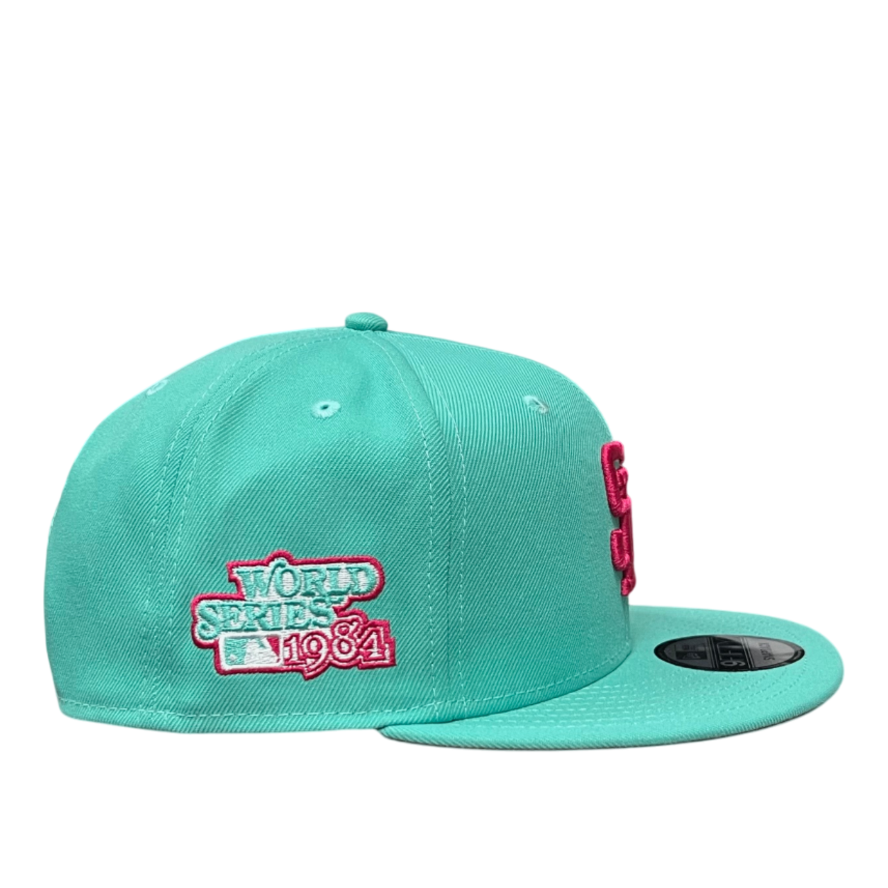 side of San Diego Padres World Series Mint Pink 9FIFTY Snapback Hat