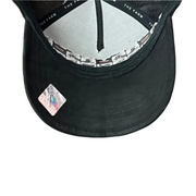 black under visor of goorin bros suede stallion black trucker snapback hat