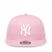 front view of Youth New York Yankees Pink 9FIFTY Snapback Cap with white embroidered NY logo and flat visor.